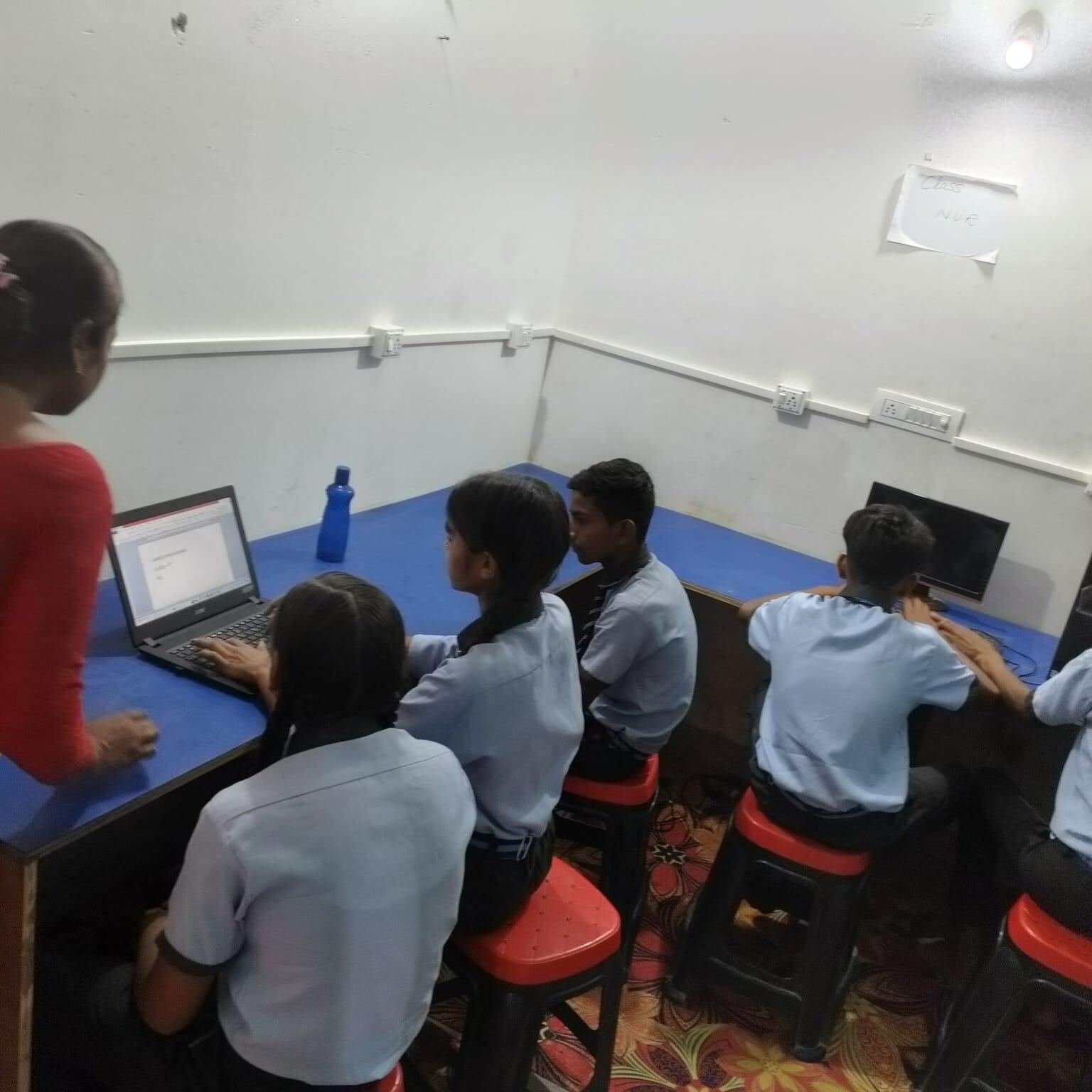 Students working on laptops in the RGS computer lab